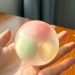 Mochi Dumpling Crispy Squishy Balls – Sesame & Strawberry